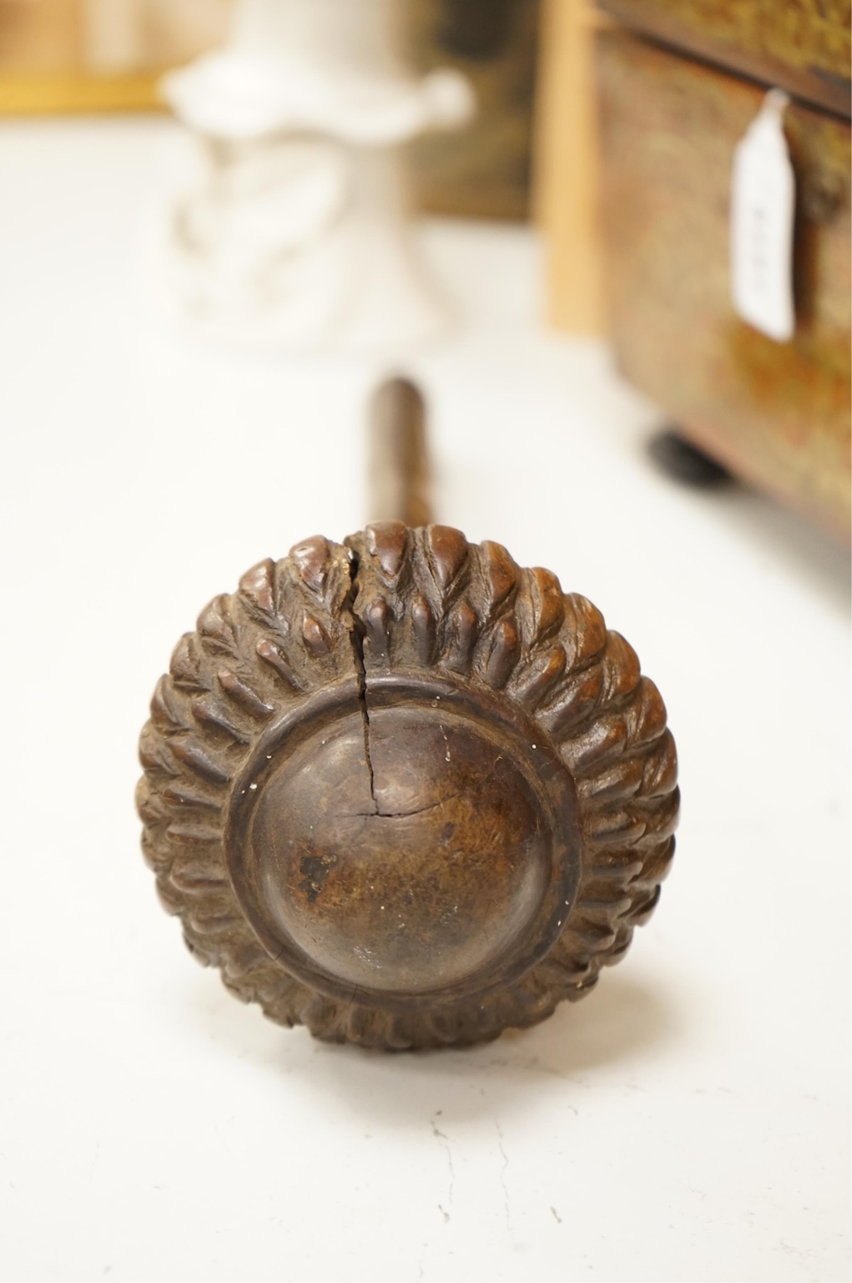 An African tribal knobkerrie with incised decoration to the handle